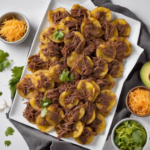 patacones con carne desmechada y queso